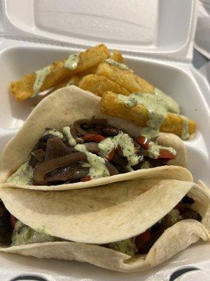 Veggie fajitas with yuca fries. Sauce is very good and spicy.