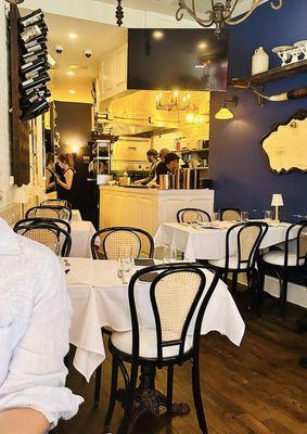 Main dining area with kitchen behind the counter