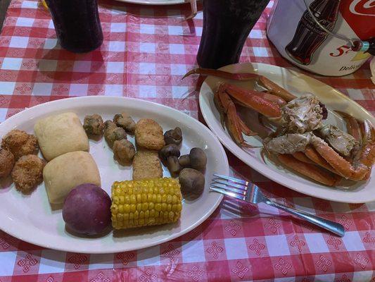 Little of everything crab boil with corn potatoes mushrooms. Sides of okra, shrimp, hush puppies even a chicken nugget.