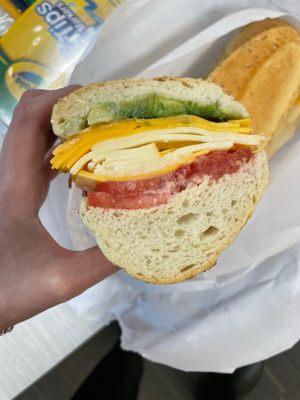 Avocado, cheddar, Muenster, tomato, and honey mustard.