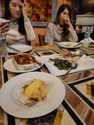 Chicken tagine and branzini with cous cous (surprisingly more flavor than any other cous cous I've had - also much finer in texture)