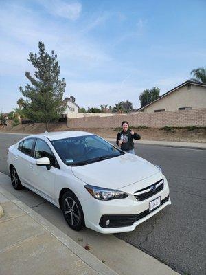 Chelsea and her new Impreza!