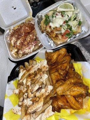 Mild lemon pepper wings, Cajun ranch fries, bacon cheese fries, & shrimp taco