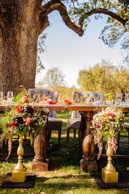 Loved How Rustic Charm's dinning-ware and furniture enhanced our wedding day!