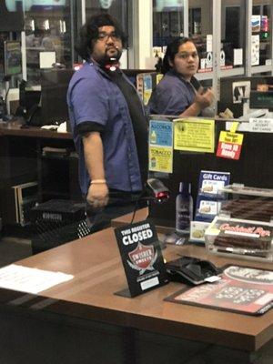 These are the cashiers who closed and locked the doors as I was walking up. I told them I had an urgent issue and needed a gas can.