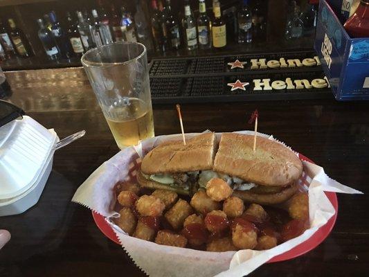 Philly cheese steak, tater tots, St. Arnold's Summer Pils.  Perfect stop!