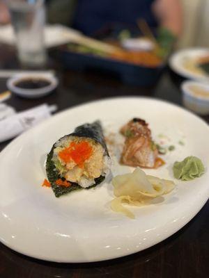 1 Piece Fire Scallop Hand Roll and salmon belly sushi