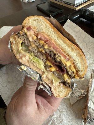 Double burger with bacon and extra pickle.