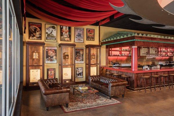 Flying Guillotine bar seating area with martial arts memorabilia