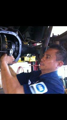 Vic at the Kona shop checking backlash and pattern after a differential overhaul