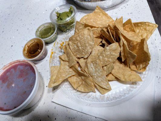 Complementary chips and salsa; the side of guacamole came with the entree