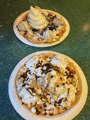 Smores and cookies n cream funnel cakes are lusciously yummy.