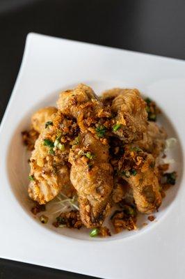 Crispy Chicken Wings - Seasoned, crispy chicken wings with garlic butter or salt and pepper style