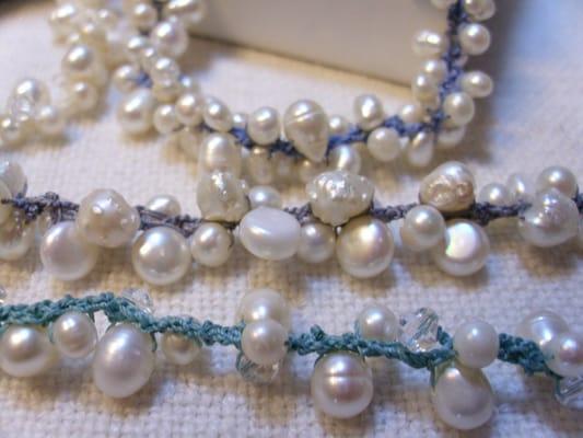 Freshwater cultured pearl ropes, shown on 4 colors of thread