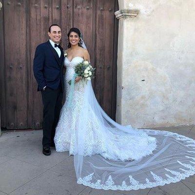 My handsome groom with a blue and back tuxedo