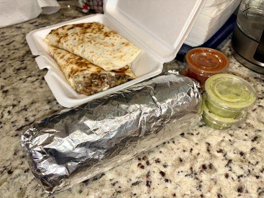 Our order to go ... Carne Asada quesadilla & Al Pastor super burrito. I think the cashier forgot to give us chips though, but that's okay.