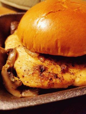 Grilled chicken sandwich with mushrooms, grilled onions, and ragin' Cajun sauce