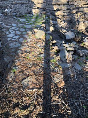 Patio that was crushed into the earth