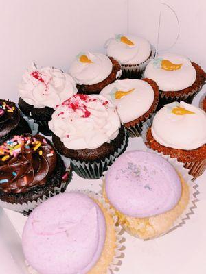 Carrot cake, chocolate, red velvet, and lavender cupcakes