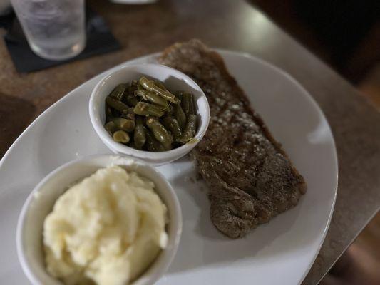 My husband NY strip.  Cold and no grill marks.  Seemed like it was cooked ahead and soaking in water?  sides also cold. $33