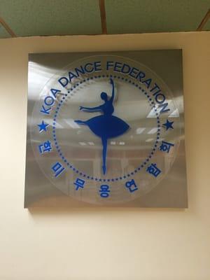 Koa dance federation symbol