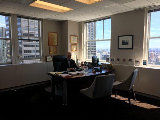 Andrew J. Smiley, Esq. at his desk