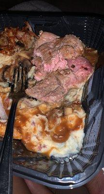 steak with mashed potatoes and hash brown