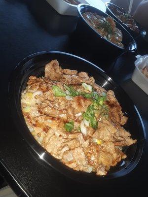 Teriyaki steak bowl with green onion on a bed of fried rice!