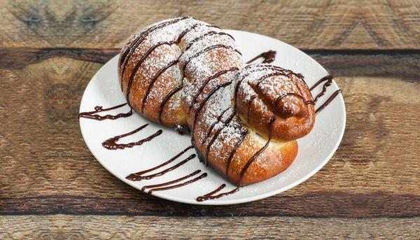 Chocolate and vanilla stuffed pretzel with chocolate drizzle