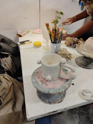 Mug getting "sanded"