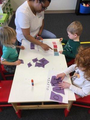 Hard at work learning to spell their names!