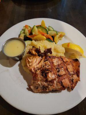 Grilled salmon with Yukon gold mashed potatoes zucchini and squash with lemon butter sauce