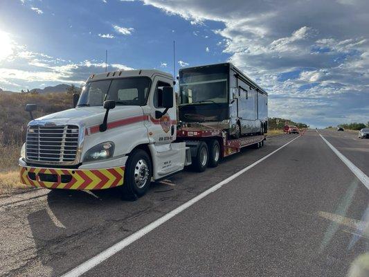 Towing a 45ft. Tiffin tag axle with our own traffic control behind us.