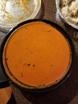 Butter chicken. (There is plenty of chicken under that sauce)