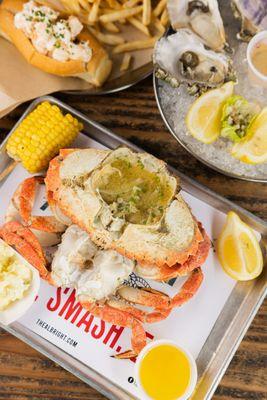 CRAB from our saltwater tanks, served with house made Potato Salad & Corn on the Cob.