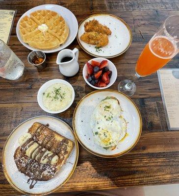 Chicken and waffles, banana Nutella French toast and avocado toast. Mango mimosas.