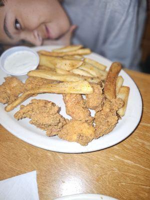 Chicken tenders and steak fries