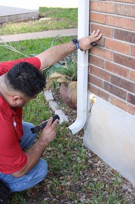 Foundation inspection. Evaluating all cracks and deficiencies.