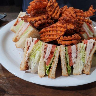 Club sandwich with sweet potato chips