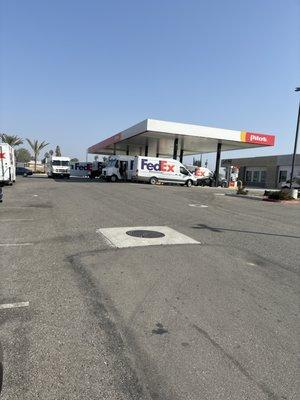 FedEx taking up space so people can't get gas