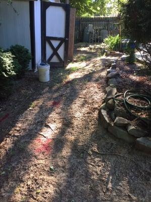 Before pic installation of belgard paver walkways, dwarf mando grass, stepping stones, stone stairs, drainage system in Lawrenceville, ga.