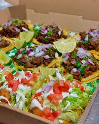 Taco Boxes Available - Buy 9 Tacos Get 3 Free Friday Special! served in a pizza box!