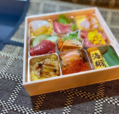 Kaito's Jewel Box ($45), fantastic splurge featuring monkfish liver, scallop with uni, botan ebi and more atop rice, noodles and daikon.