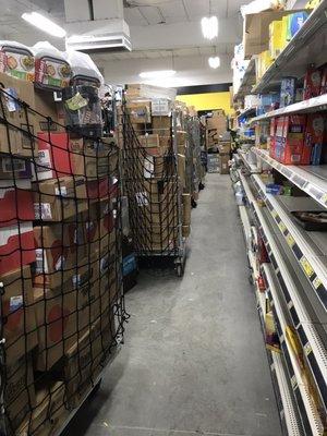 Impassible aisles filled with inventory carts that never get unloaded.