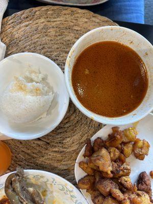 Peanut butter soup, rice ball, fried plantain