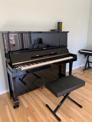 Piano is in new condition and has a beautiful sound and action.