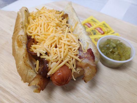 Bacon Cheddar Dog loaded up with 4-strips of bacon and shredded cheddar cheese.