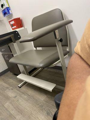 Phlebotomist blood draw chair.