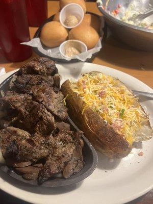 Steak pieces baked potato