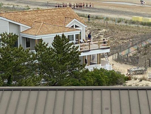 Picture of the house being renovated on the beach.